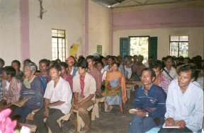 Farmers attentively listening to the lecture